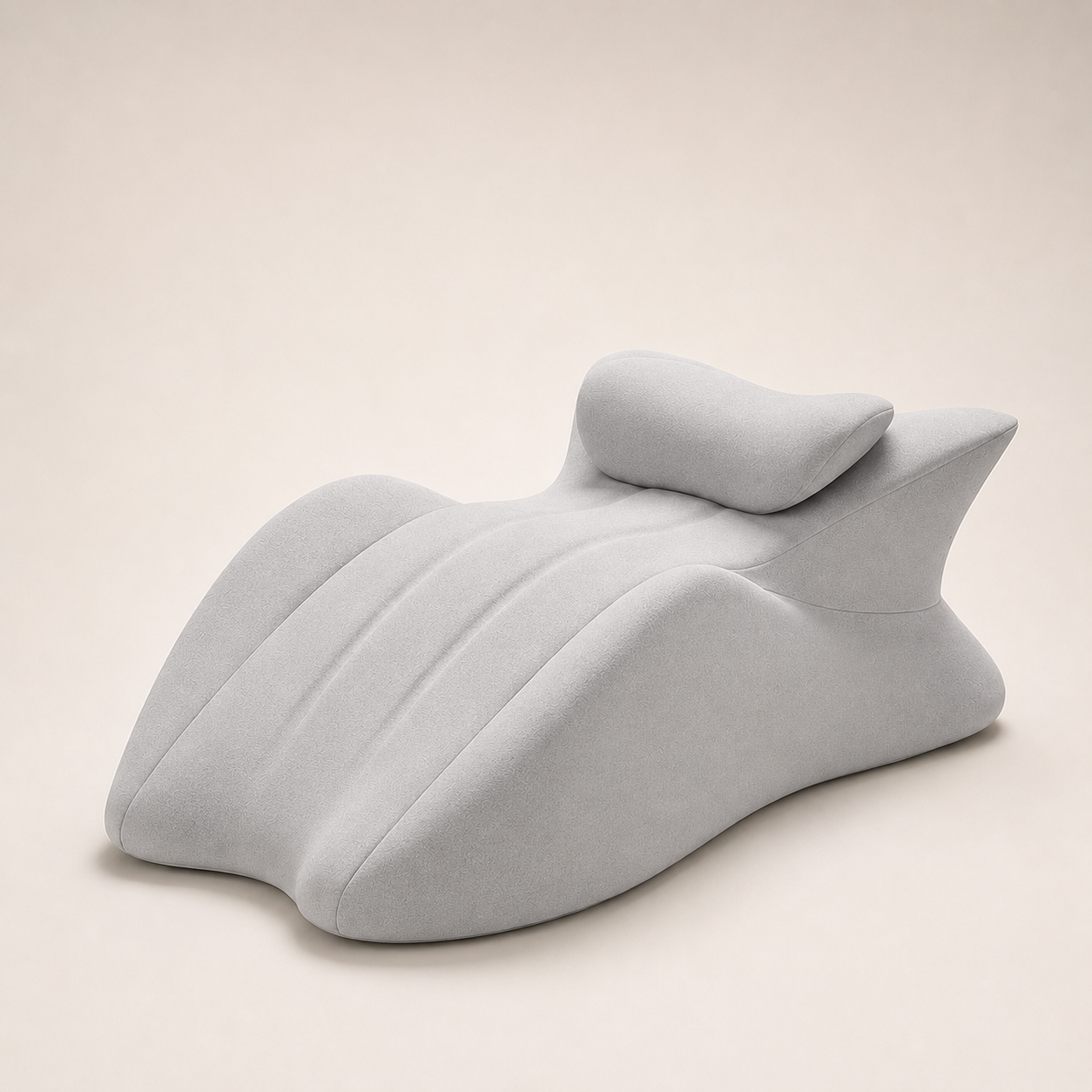 Gray wedge-shaped pillow on a beige background
